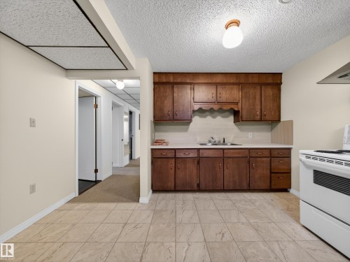 8906 83 Avenue, Edmonton, AB - Indoor Photo Showing Kitchen With Double Sink