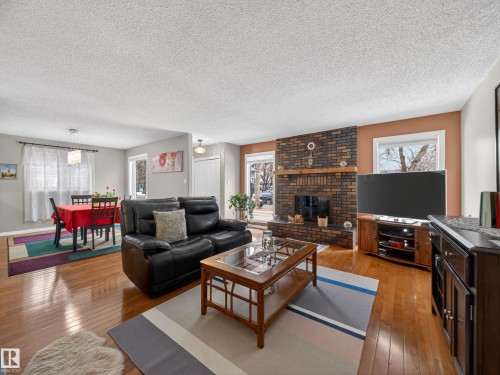 8906 83 Avenue, Edmonton, AB - Indoor Photo Showing Living Room With Fireplace