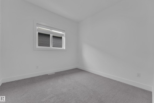 This room features light grey carpet flooring and white walls - 110 Eldridge Point(E), St. Albert, AB - Indoor Photo Showing Other Room