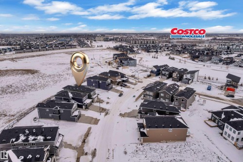 This property is situated within a developed residential area featuring various housing styles - 110 Eldridge Point(E), St. Albert, AB - Outdoor With View