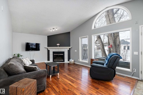 3706 131A Avenue, Edmonton, AB - Indoor Photo Showing Living Room With Fireplace