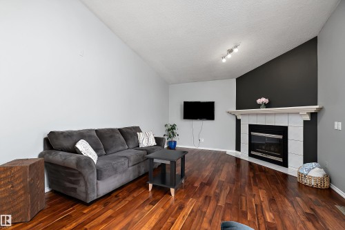3706 131A Avenue, Edmonton, AB - Indoor Photo Showing Living Room With Fireplace