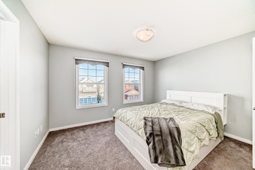 425 Simpkins Link, Leduc, AB - Indoor Photo Showing Bedroom