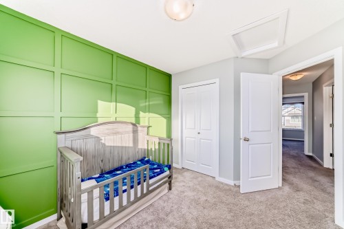 425 Simpkins Link, Leduc, AB - Indoor Photo Showing Bedroom