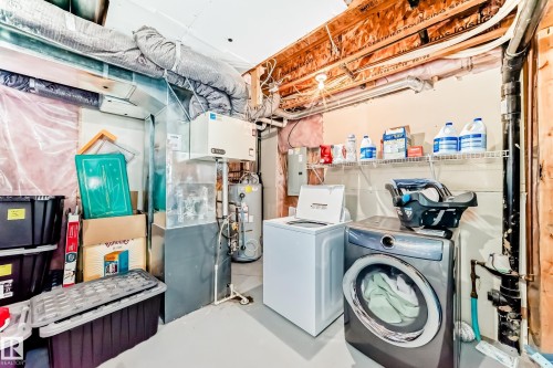 425 Simpkins Link, Leduc, AB - Indoor Photo Showing Laundry Room