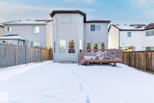 The property features a fenced yard with a deck - 1121 59A Street, Edmonton, AB - Outdoor With Exterior