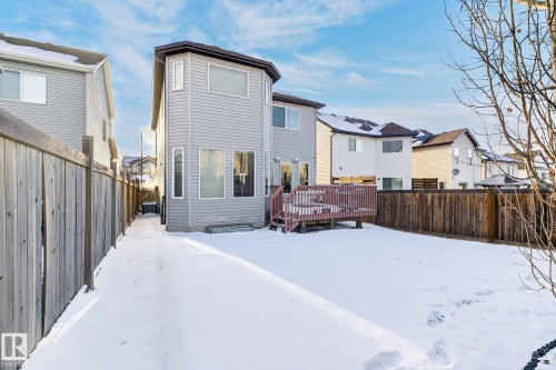 The property features a private fenced yard with a deck - 1121 59A Street, Edmonton, AB - Outdoor