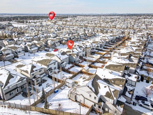 Aerial view of a residential area with snow-covered rooftops - 1121 59A Street, Edmonton, AB - Outdoor With View