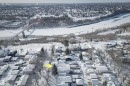 Aerial view of the property and its surrounding neighbourhood, featuring a nearby river and a bridge - 11116 52 Street Nw, Edmonton, AB  - Outdoor With View 