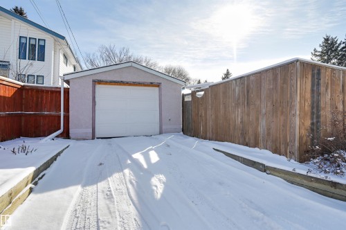 Detached garage with a white garage door - 11116 52 Street Nw, Edmonton, AB - Outdoor With Exterior