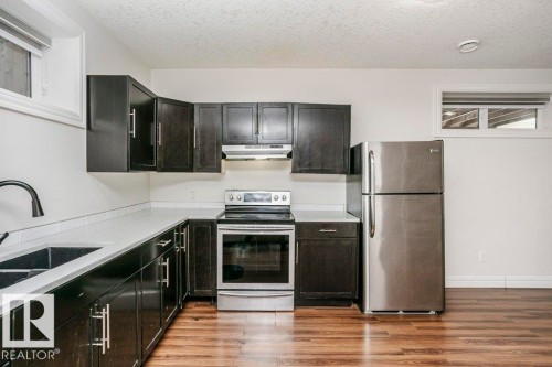 1520 67 Street, Edmonton, AB - Indoor Photo Showing Kitchen With Stainless Steel Kitchen With Double Sink