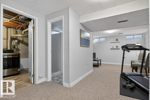 Finished basement - 91 Hearthstone, Edmonton, AB - Indoor Photo Showing Gym Room