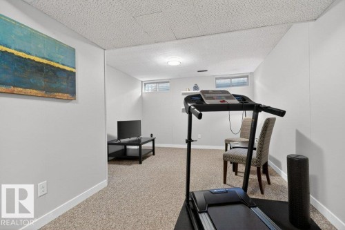 This versatile room offers a flexible space - 91 Hearthstone, Edmonton, AB - Indoor