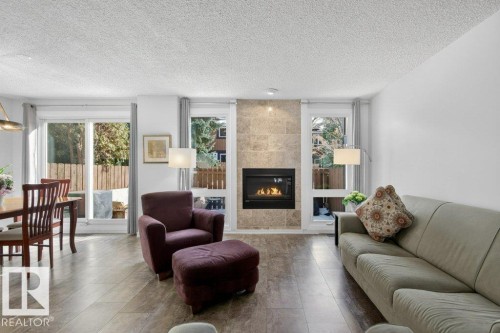 91 Hearthstone, Edmonton, AB - Indoor Photo Showing Living Room With Fireplace