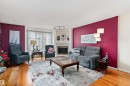 26 2419 133 Avenue, Edmonton, AB  - Indoor Photo Showing Living Room With Fireplace 