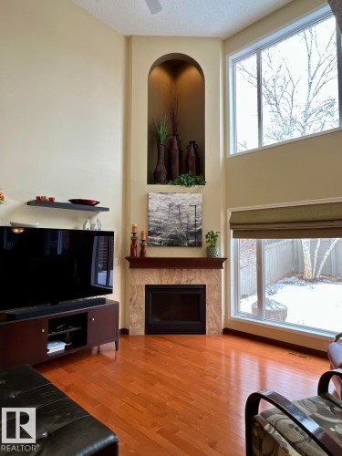 11716 11A Avenue, Edmonton, AB - Indoor Photo Showing Living Room With Fireplace