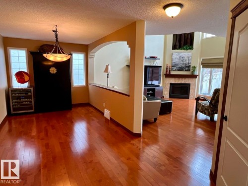 11716 11A Avenue, Edmonton, AB - Indoor Photo Showing Other Room With Fireplace