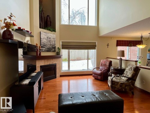11716 11A Avenue, Edmonton, AB - Indoor Photo Showing Living Room With Fireplace