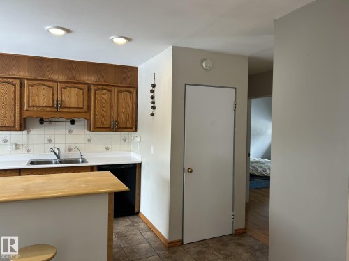 9128 83 Street, Edmonton, AB - Indoor Photo Showing Kitchen With Double Sink