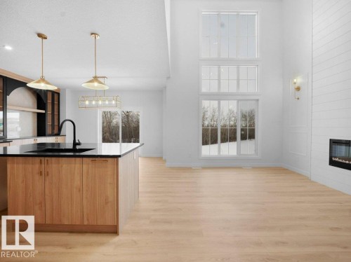 3282 Chernowski Way, Edmonton, AB - Indoor Photo Showing Other Room With Fireplace