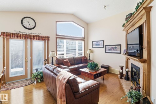 5 Richelieu Place, Beaumont, AB - Indoor Photo Showing Living Room With Fireplace