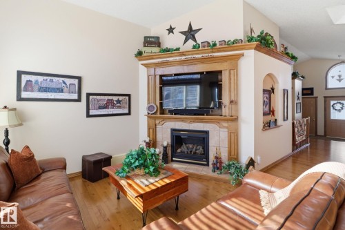 5 Richelieu Place, Beaumont, AB - Indoor Photo Showing Living Room With Fireplace