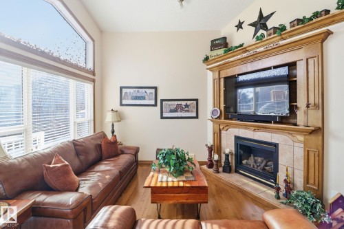 5 Richelieu Place, Beaumont, AB - Indoor Photo Showing Living Room With Fireplace