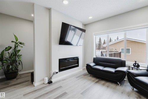 343 Edgemont Drive, Edmonton, AB - Indoor Photo Showing Living Room With Fireplace