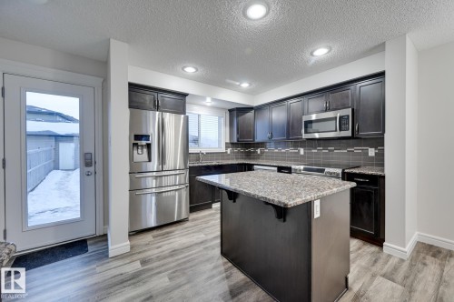 59 Harvest Ridge Drive, Spruce Grove, AB - Indoor Photo Showing Kitchen With Stainless Steel Kitchen With Upgraded Kitchen
