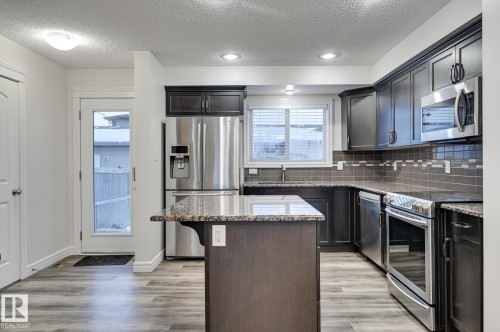 59 Harvest Ridge Drive, Spruce Grove, AB - Indoor Photo Showing Kitchen With Stainless Steel Kitchen With Upgraded Kitchen