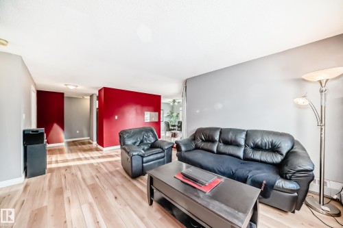 239 10636 120 Street, Edmonton, AB - Indoor Photo Showing Living Room