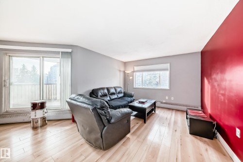 239 10636 120 Street, Edmonton, AB - Indoor Photo Showing Living Room