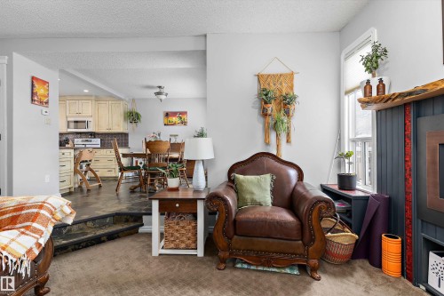 9 4403 Riverbend Road, Edmonton, AB - Indoor Photo Showing Living Room