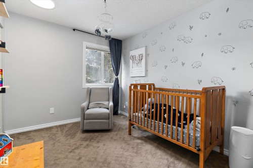 9 4403 Riverbend Road, Edmonton, AB - Indoor Photo Showing Bedroom