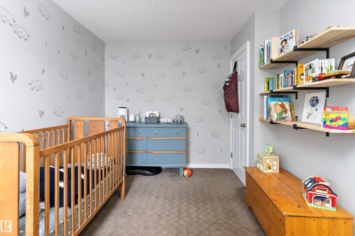 9 4403 Riverbend Road, Edmonton, AB - Indoor Photo Showing Bedroom