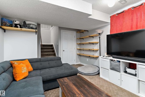 9 4403 Riverbend Road, Edmonton, AB - Indoor Photo Showing Living Room