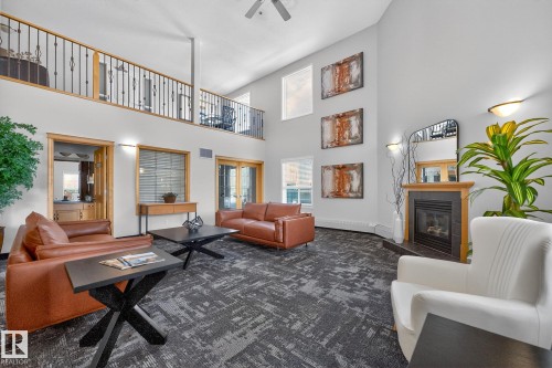 411 1320 Rutherford Road, Edmonton, AB - Indoor Photo Showing Living Room With Fireplace