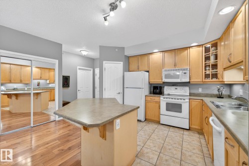 411 1320 Rutherford Road, Edmonton, AB - Indoor Photo Showing Kitchen With Double Sink
