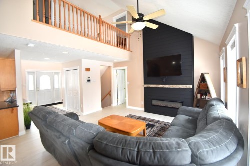 4604 4A Street, Boyle, AB - Indoor Photo Showing Living Room With Fireplace