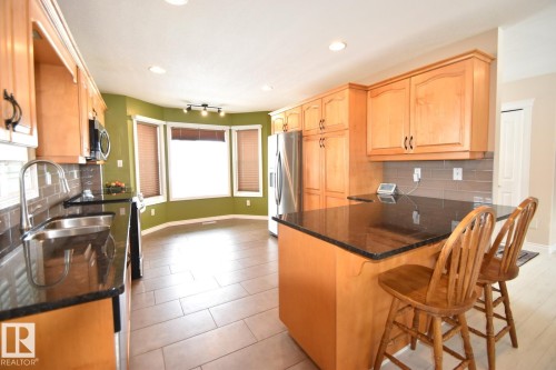 4604 4A Street, Boyle, AB - Indoor Photo Showing Kitchen With Double Sink
