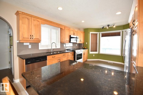 4604 4A Street, Boyle, AB - Indoor Photo Showing Kitchen With Double Sink