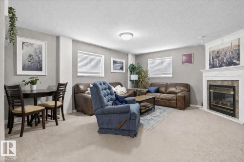 83 Hamilton Crescent, St. Albert, AB - Indoor Photo Showing Living Room With Fireplace