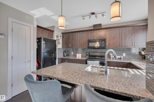 1768 Cunningham Way, Edmonton, AB - Indoor Photo Showing Kitchen With Double Sink With Upgraded Kitchen