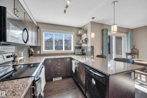 1768 Cunningham Way, Edmonton, AB - Indoor Photo Showing Kitchen With Double Sink With Upgraded Kitchen