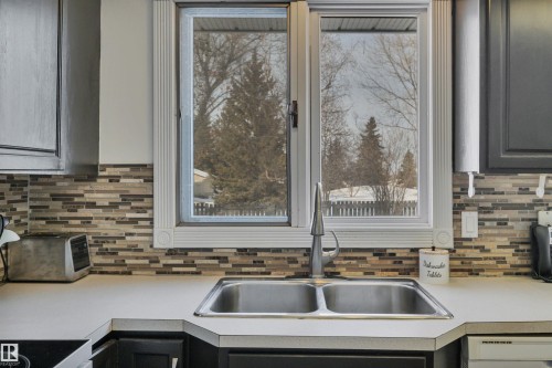 4318 43 Avenue, Leduc, AB - Indoor Photo Showing Kitchen With Double Sink