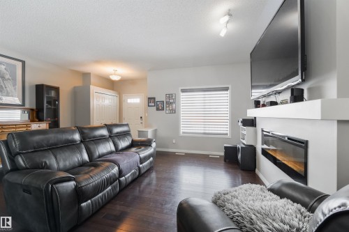 8333 Ellis Crescent, Edmonton, AB - Indoor Photo Showing Living Room With Fireplace