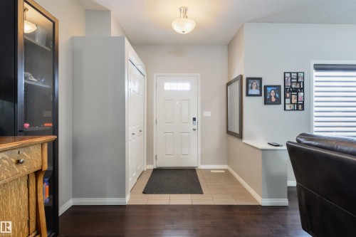 8333 Ellis Crescent, Edmonton, AB - Indoor Photo Showing Living Room With Fireplace
