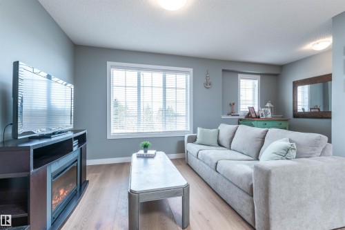 38 20 Augustine Crescent, Sherwood Park, AB - Indoor Photo Showing Living Room With Fireplace