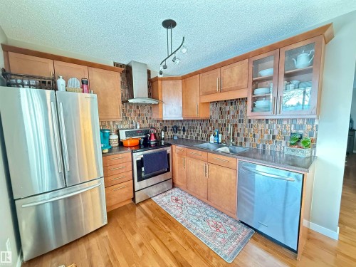 7810 91 Street, Edmonton, AB - Indoor Photo Showing Kitchen With Double Sink