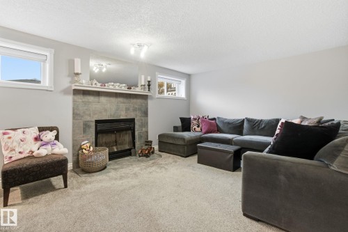 373 Kline Crescent, Edmonton, AB - Indoor Photo Showing Living Room With Fireplace